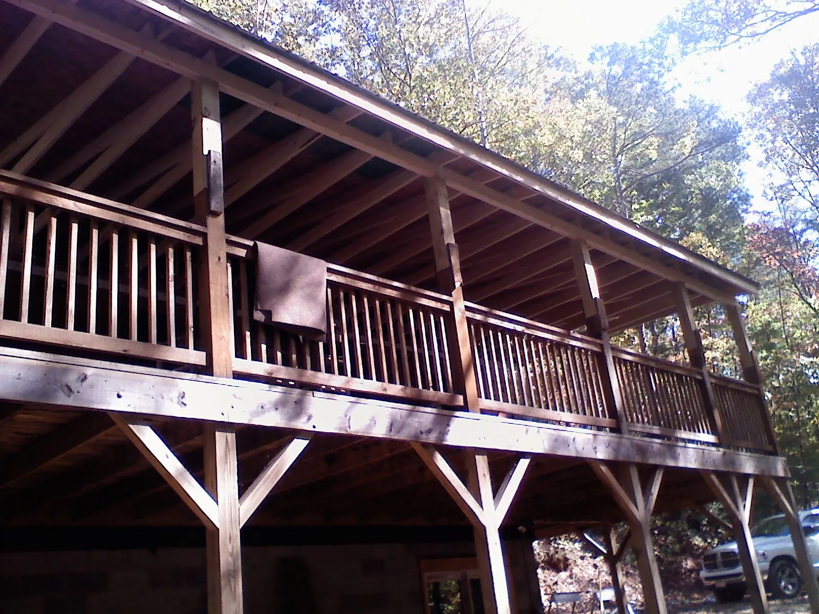 Timber framing under a new elevated porch and deck — Roof Leak Repair in Peculiar by Roofing Brothers